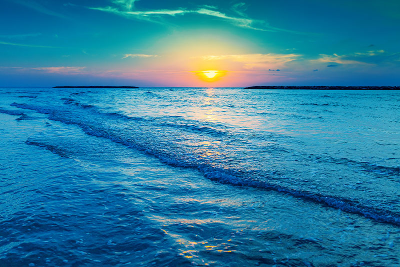 nature stock photo of a sunrise on the beach