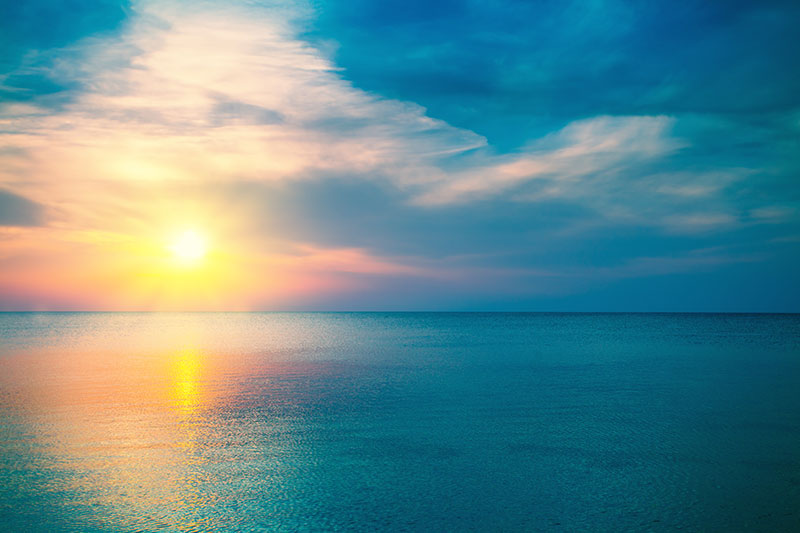 stock nature photo of sunset on the ocean