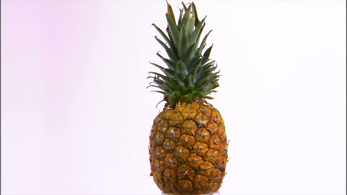 Pineapple with Cut Out Wedge Rotating Stock Photo Pineapple with Cut Out Wedge Rotating Stock Photo