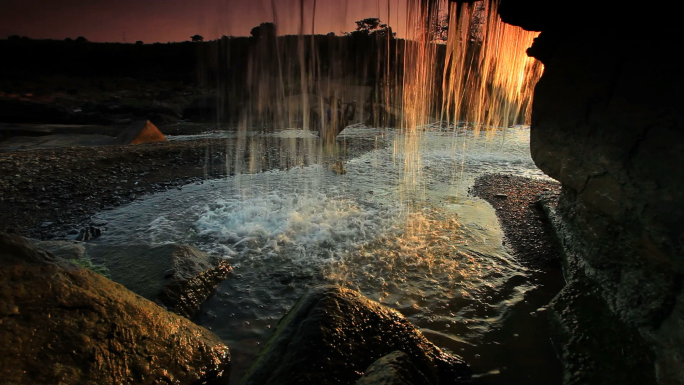 Inside Shot of a Waterfall at Sunset